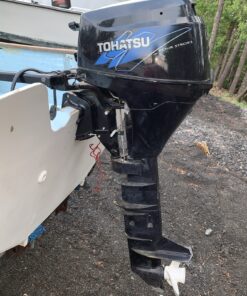 2007 Tohatsu 9.8 four stroke 25 inch Kicker/sailboat motor electric start.