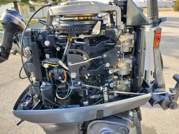 Used 1999 Johnson 65HP 3-Cylinder Carbureted 2-Stroke Commercial Tiller Outboard Motor – 20" Long Shaft – Manual Start