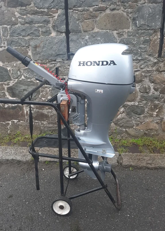 Used 10hp honda fourstroke, pull start on tiller, short shaft