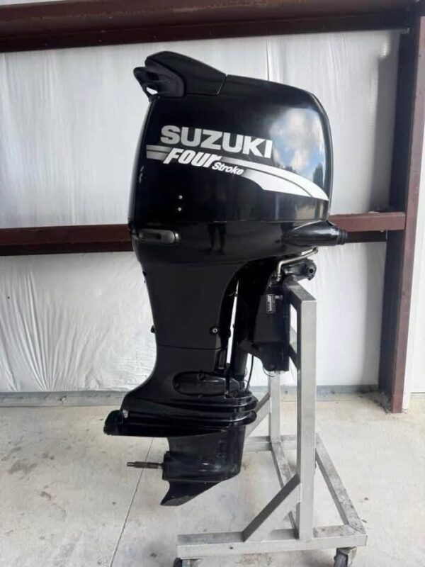 Used 2005 Suzuki DF140 140 HP 4-Stroke Outboard Motor – 25" Shaft – 353 Hours – Controls & Stainless Propeller
