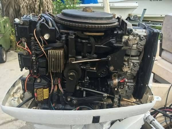 Used Johnson 70 HP 3-Cylinder 2-Stroke Outboard Motor – 20" Shaft – Electric Start – Remote Controls